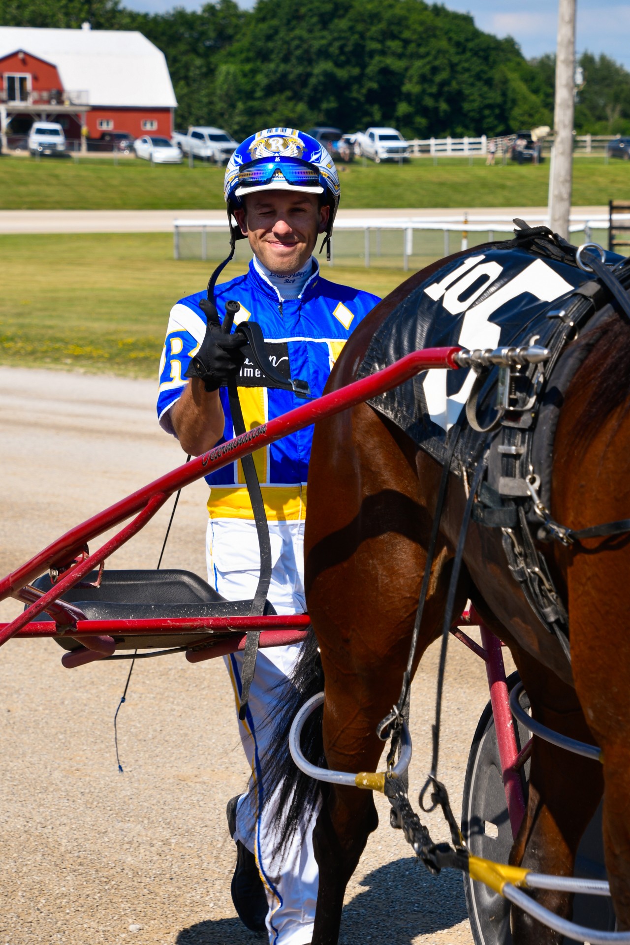 Driver Louis-Philippe Roy after winning the Kin Pace Final with Greatest Pleasure at Clinton Raceway on July 7, 2024 (Jessica Carnochan/Clinton Raceway)