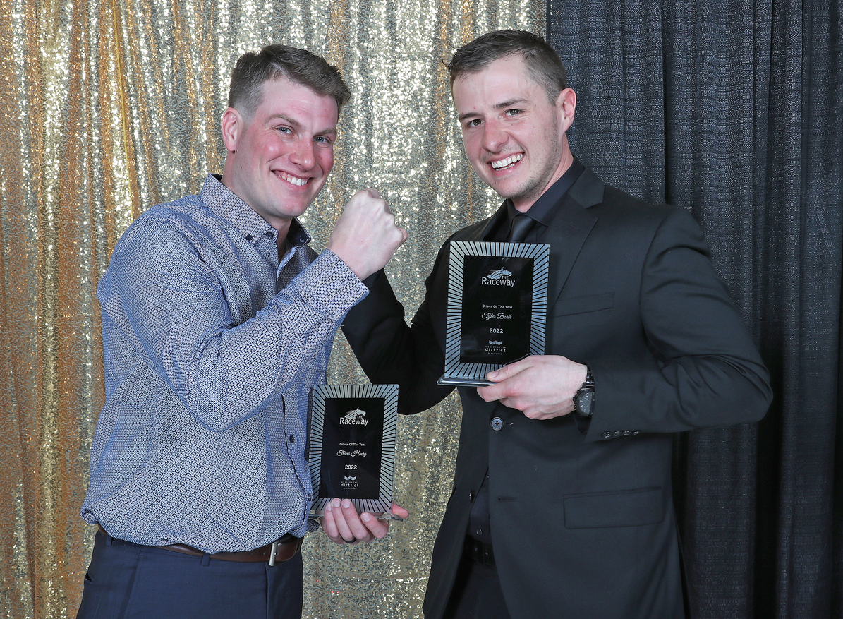Borth (right) poses with Travis Henry a the 2023 The Raceway at the Western Fair District Awards where they shared Driver of the Year honours. (Claus Anderson)