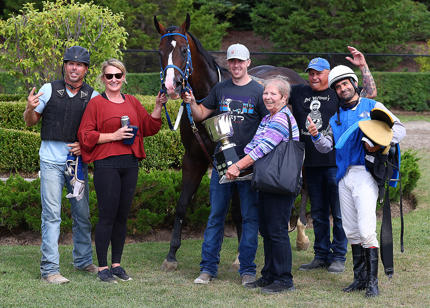 The Had to Be Ivory team from left to right, Mike Robertson, Jaime Robertson, Had to Be Ivory, Zac Kennedy, Carol Robertson, Paul Sauve, and Cory Spataro. Trainer Bryn Robertson was absent. (New Imag