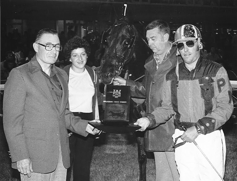 Jet Sky, an Armbro Jet colt, is shown in the winner’s circle with his owners Brenda and Harold Walker of Sault Ste. Marie Ont.