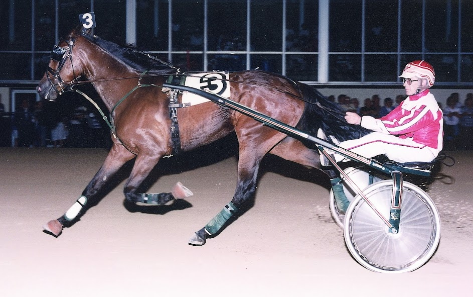 Veras Image and driver Larry Walker are shown scoring before a race.