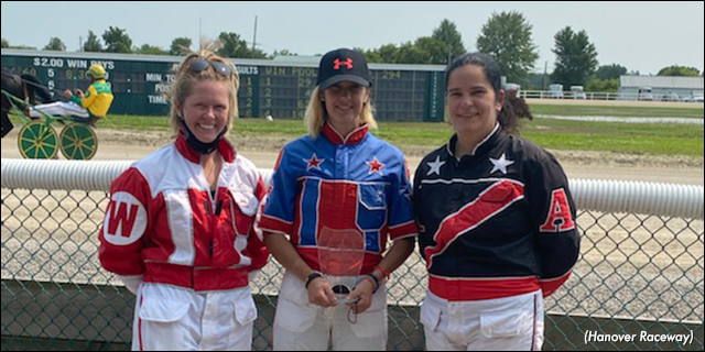 Ontario Women's Driving Champion Natasha Day (centre), flanked by runner-up Marie-Claude Auger (right) and third-place finisher Julie Walker (left).