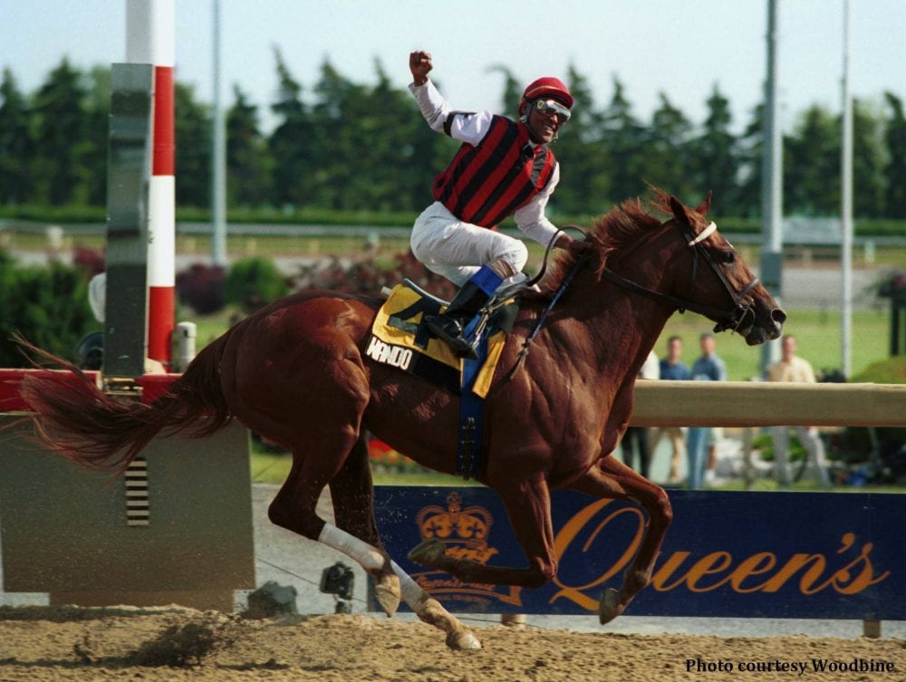 Mike Keogh trained Wando and jockey Patrick Husbands winning The Queen's Plate in 2003 at Woodbine (Michael Burns Photo)