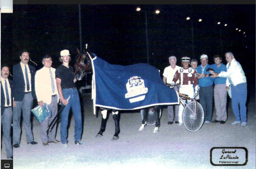 Apaches Fame (Brad Fritz) sets a two-year-old pacing track record at Kawartha Downs in 1:56.3 on Aug. 26, 1989.